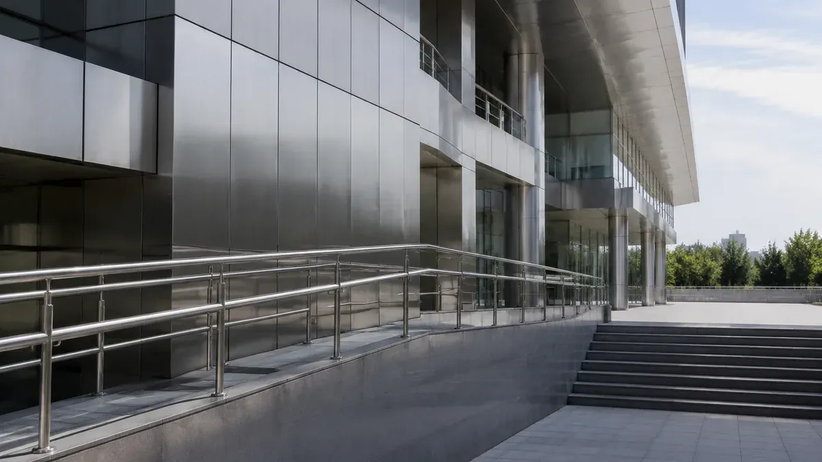 Illustrative stainless steel facade panels and handrails