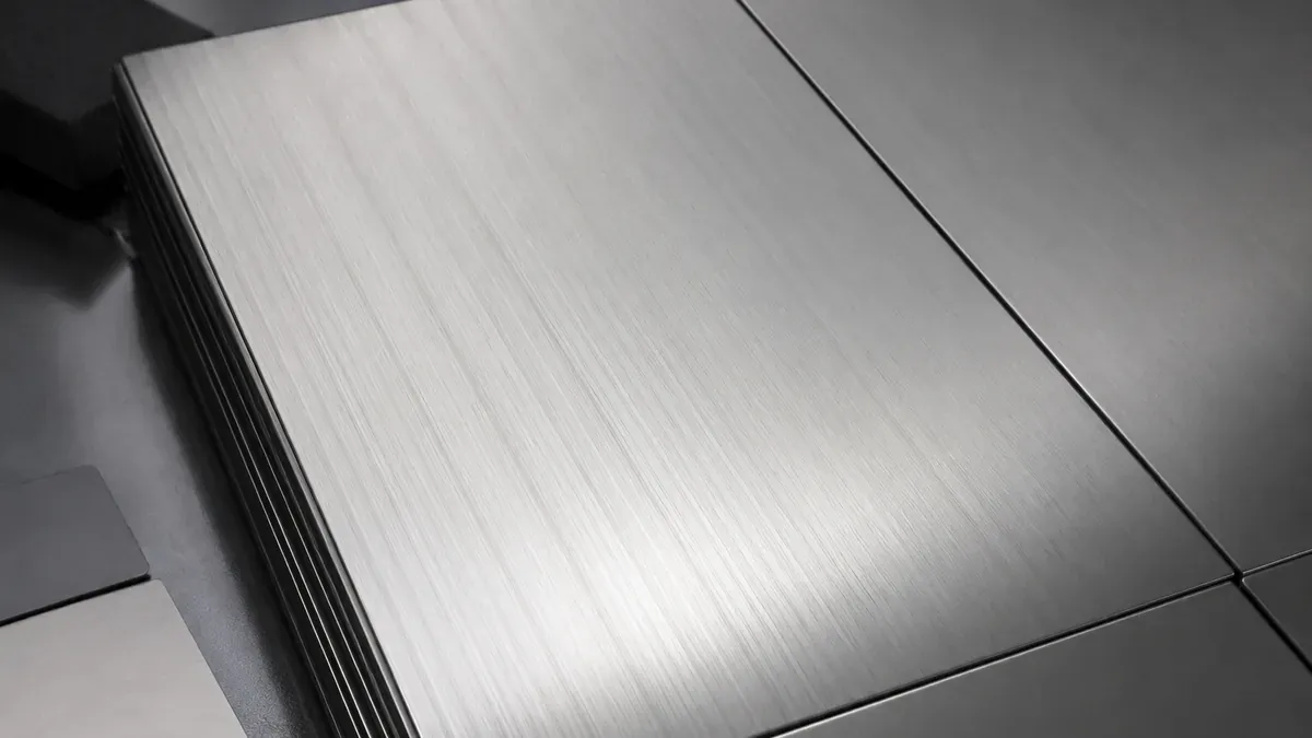 Illustrative hairline stainless steel panels with fine continuous directional grain