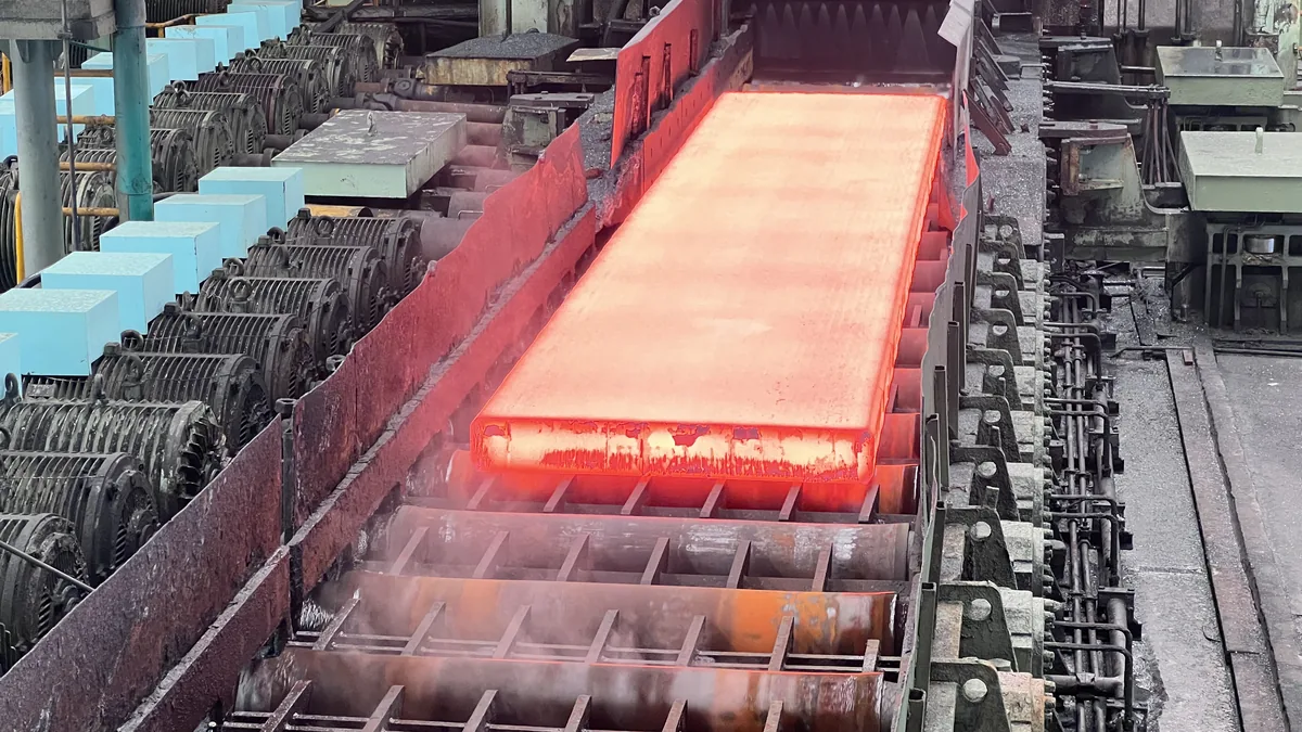 Inspector checking stainless tube surface condition and certificate data for sanitary finish acceptance